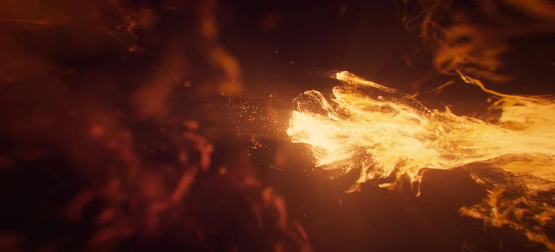 Close-up of a bright orange flame against a dark background, symbolizing energy use and maintenance considerations for hot tub operation.